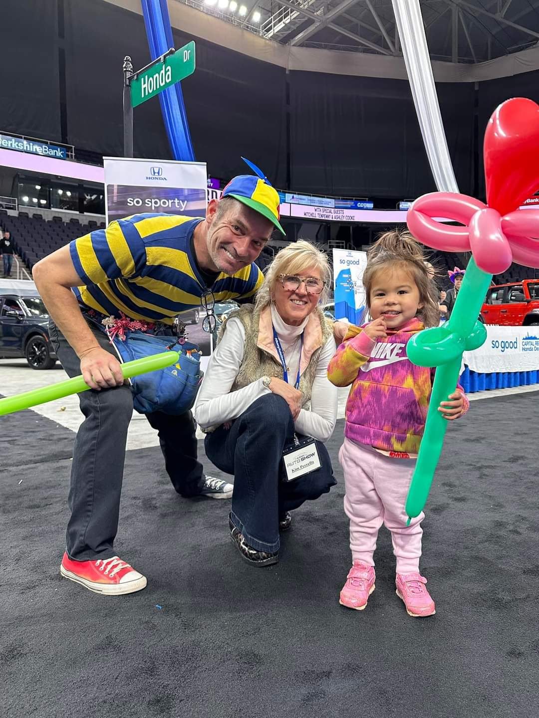 Mr. Twisty at a corporate expo with guests